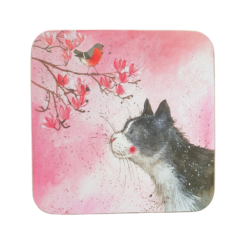 Tapis en forme de carré aux coins arrondis avec illustration d’un chat noir et blanc regardant des fleurs roses sur une branches de cerisier, fond rose pastel.